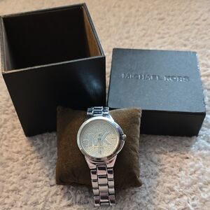 Michael Kors Silver-tone MK Logo Bracelet Watch
